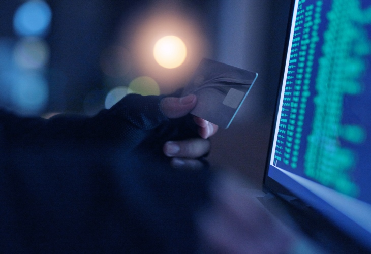 hacker-credit-card-laptop-cybersecurity